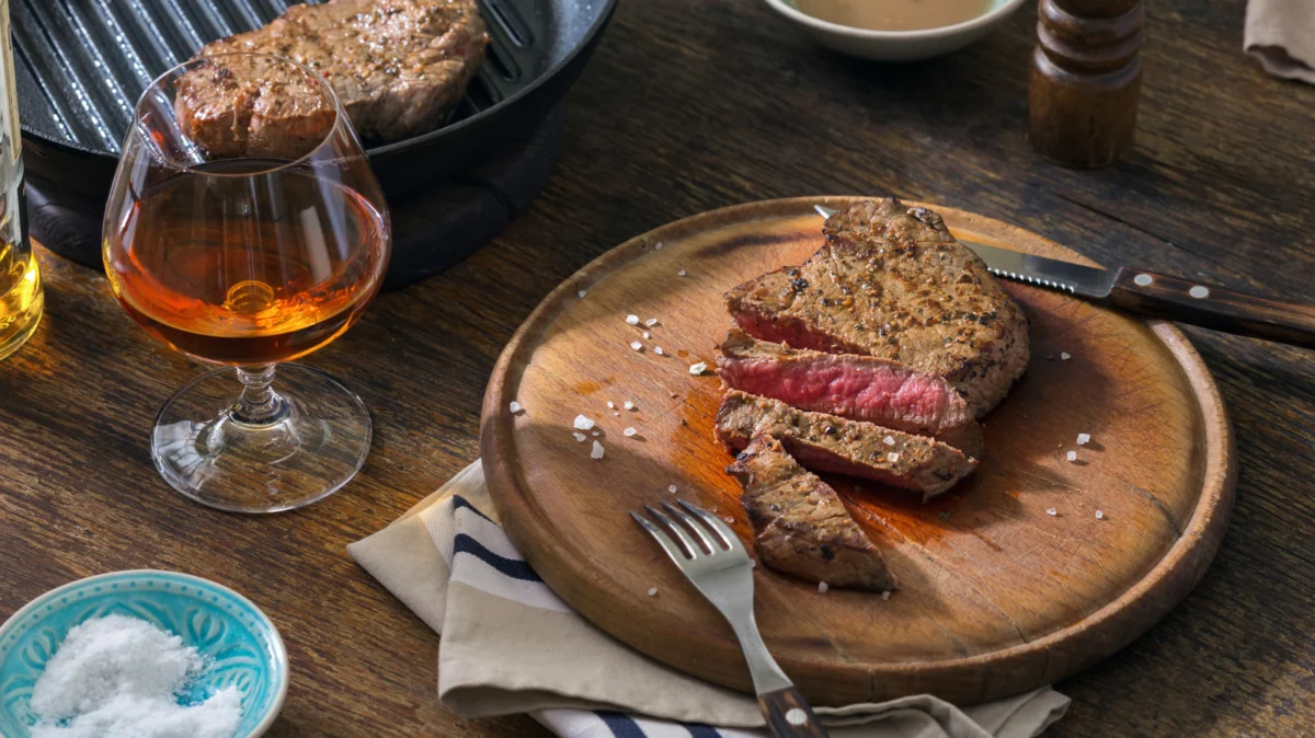 The Spirit of the Sear: Why Ribeye and Scotch Represent the Ultimate Culinary Synergy